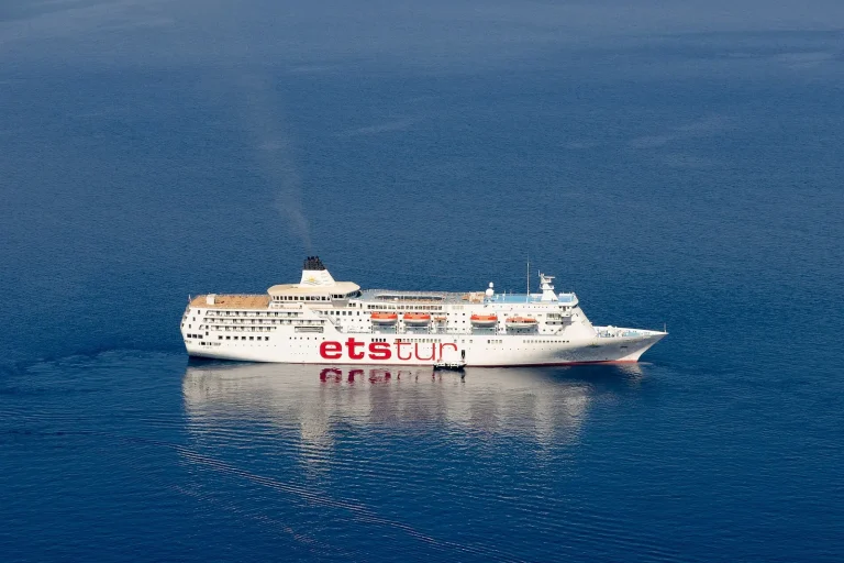 Cruise ship sailing in the Santorini caldera